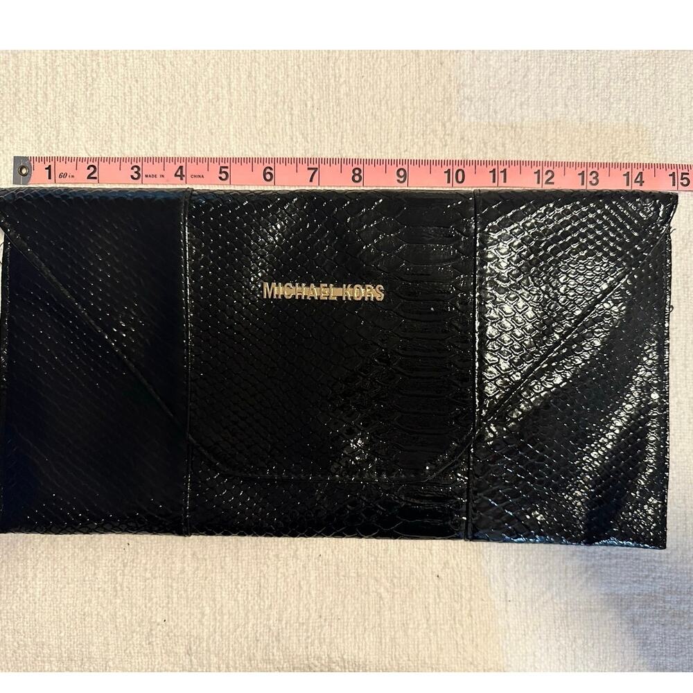 Micheal’s kors elegant big over sized clutch purse black & gold mint condition